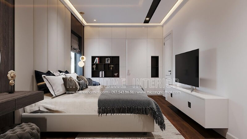 Kệ tivi sơn trắng gỗ công nghiệp ấn tượng với tay nắm âm độc đáo tạo vẻ đẹp sang trọng cho phòng ngủ hiện đại. Thiết kế phòng ngủ biệt thự