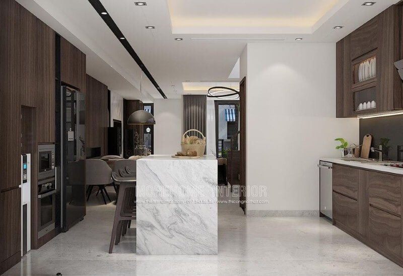 Tủ bếp gỗ veneer sậm màu kết hợp bàn đảo ốp đá tạo nên vẻ đẹp sang trọng cuốn hút cho phòng bếp.