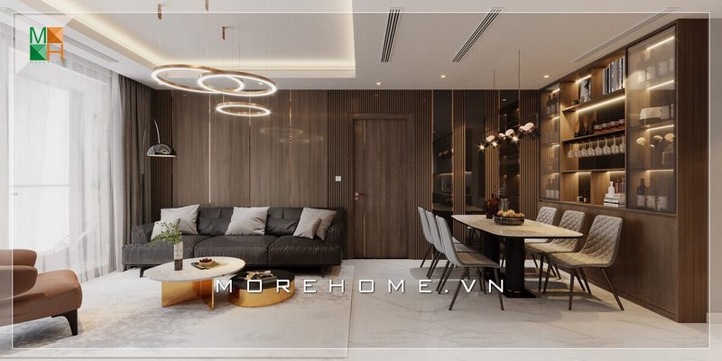 Mẫu thiết kế phòng khách liền phòng ăn được phân chia không gian rõ ràng nhờ hệ thống trần giật cấp và hệ thống đèn thả sang trọng
