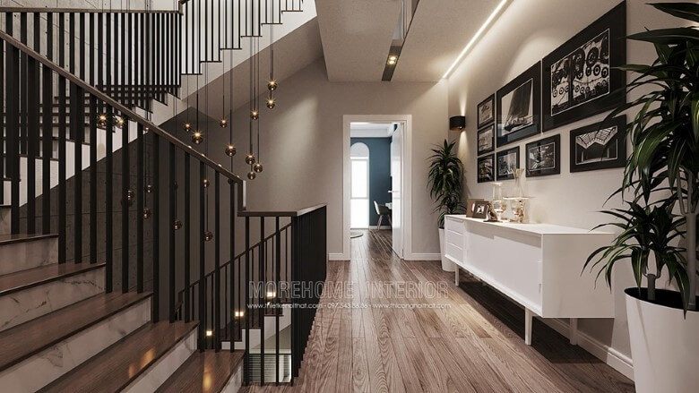 trên
Mẫu kệ tủ gỗ trang trí màu trắng hiện đại và tinh tế được sử dụng để làm nổi bật không gian hành lang tầng trên.